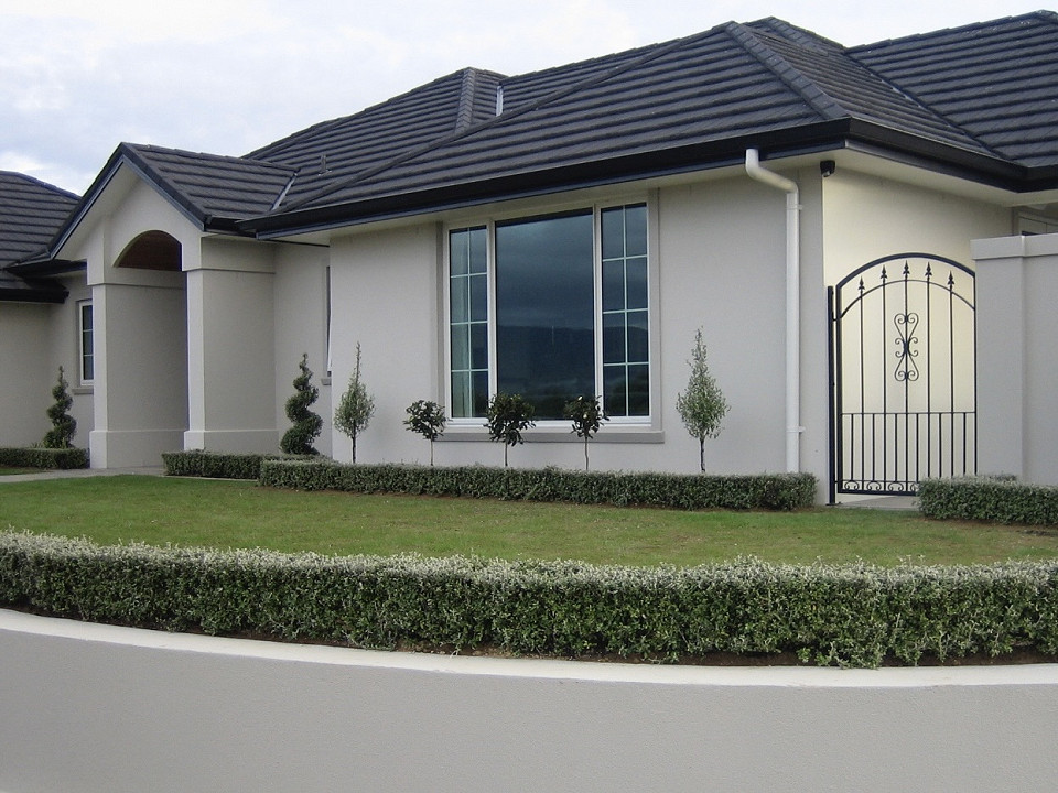 Living Walls™ hedges defining lawns and entrances in a formal garden